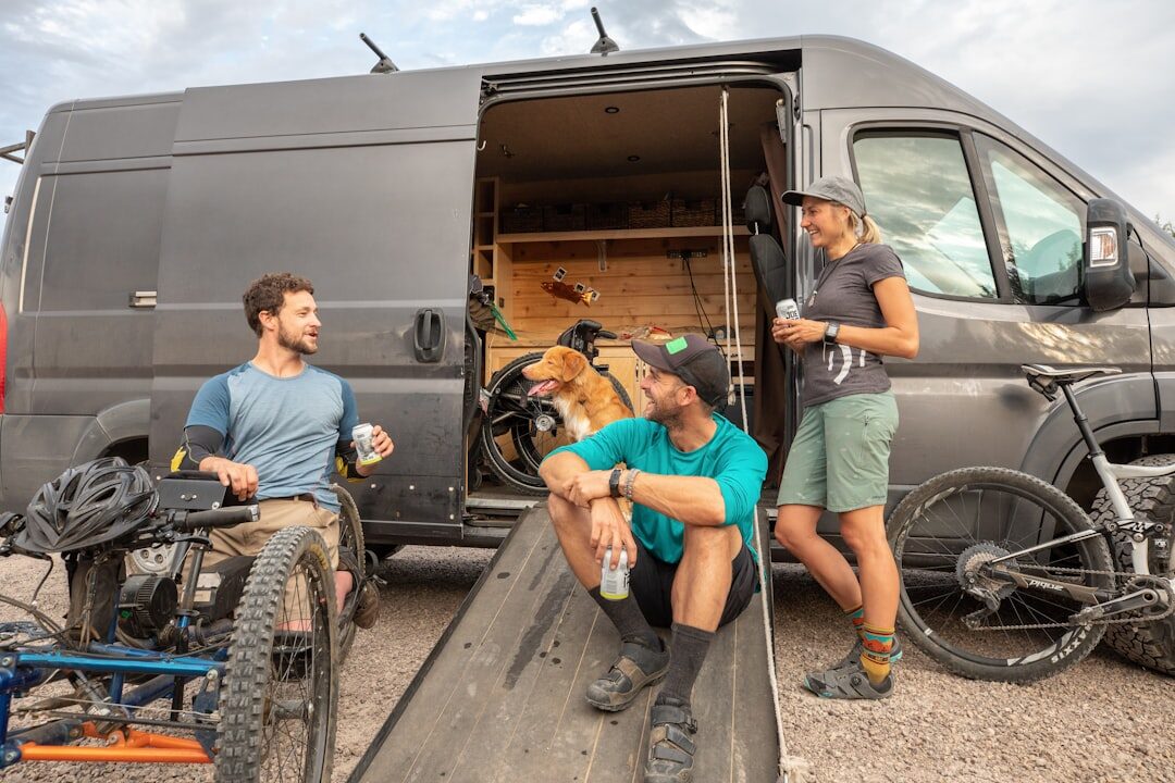 Crew loading camera equipment into an outside broadcast van